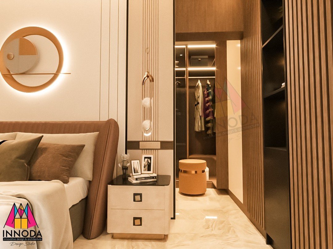 Luxury master bedroom with walk-in glass closet and halo mirror